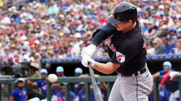 Mar 12, 2024; Surprise, Arizona, USA; Cleveland Guardians designated hitter Kyle Manzardo (73) bats against the Texas Rangers during the second inning at Surprise Stadium.